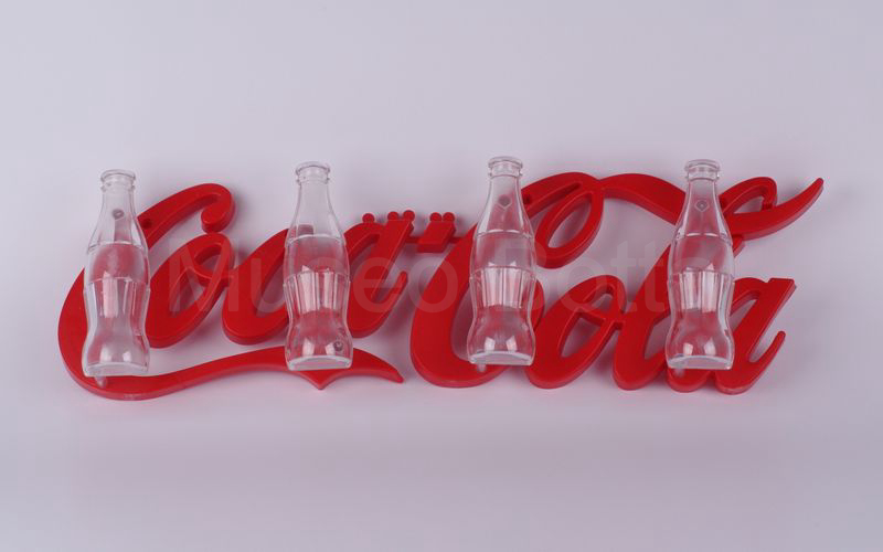 COCA-COLA attaccapanni in plastica con 4 bottigliette per appendini