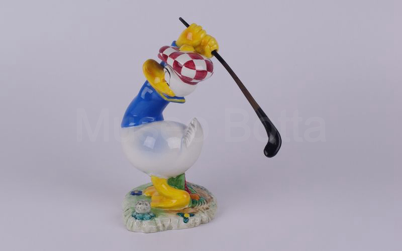 WALT DISNEY Paperino golfista che tira in ceramica (Zaccagnini)