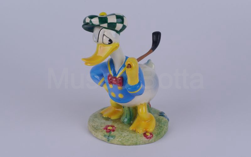 WALT DISNEY Paperino golfista con mazza in spalla in ceramica (Zaccagnini)