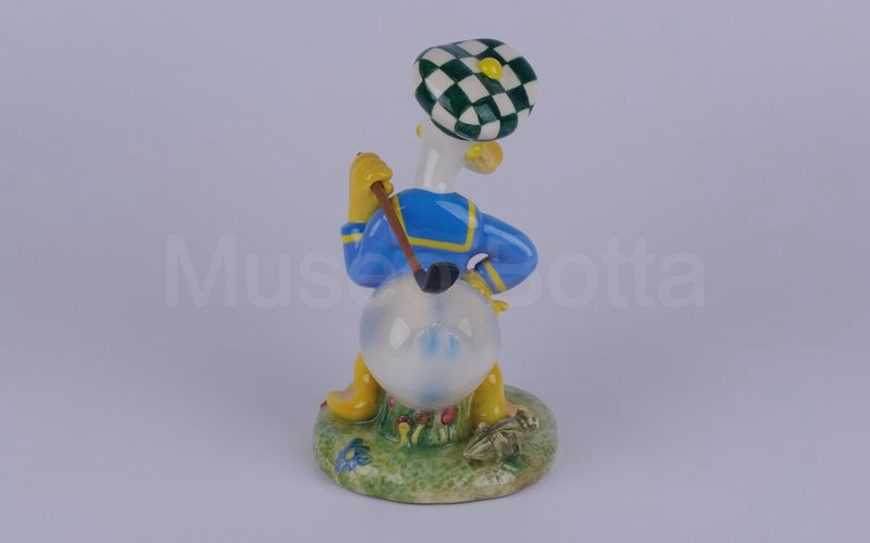 WALT DISNEY Paperino golfista con mazza in spalla in ceramica (Zaccagnini)