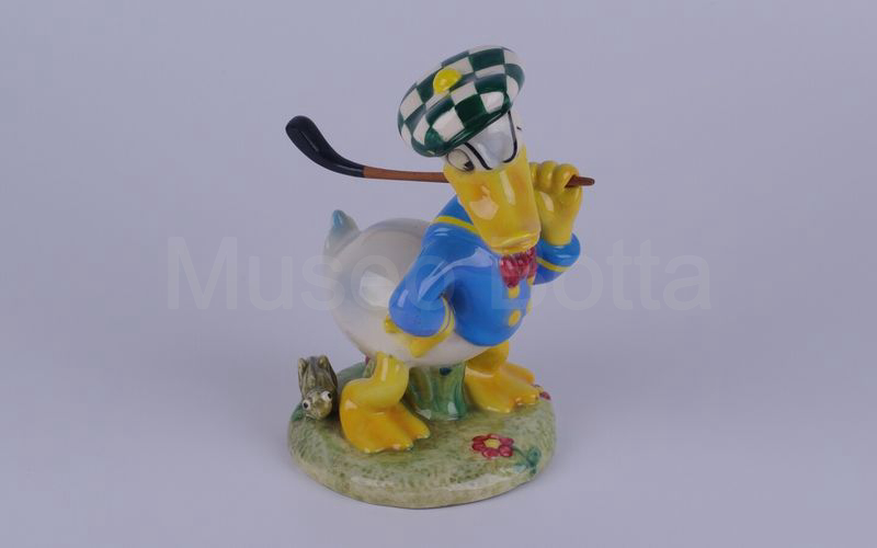 WALT DISNEY Paperino golfista con mazza in spalla in ceramica (Zaccagnini)