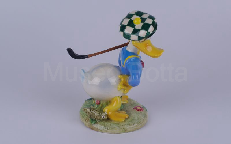 WALT DISNEY Paperino golfista con mazza in spalla in ceramica (Zaccagnini)