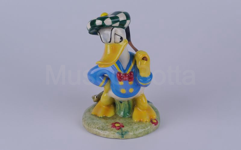 WALT DISNEY Paperino golfista con mazza in spalla in ceramica (Zaccagnini)